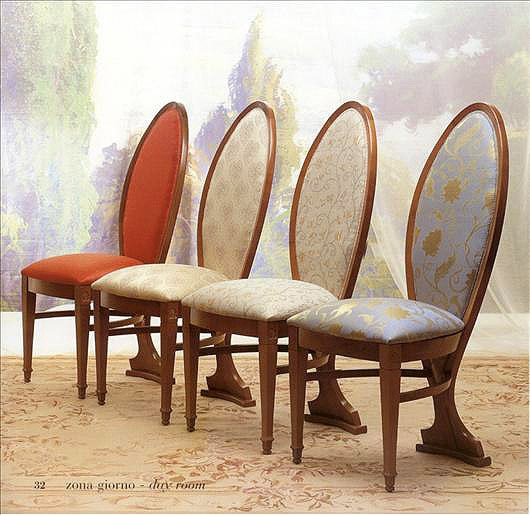 The chair with the frame made of solid wood upholstered in fabric SE14, Carpanelli