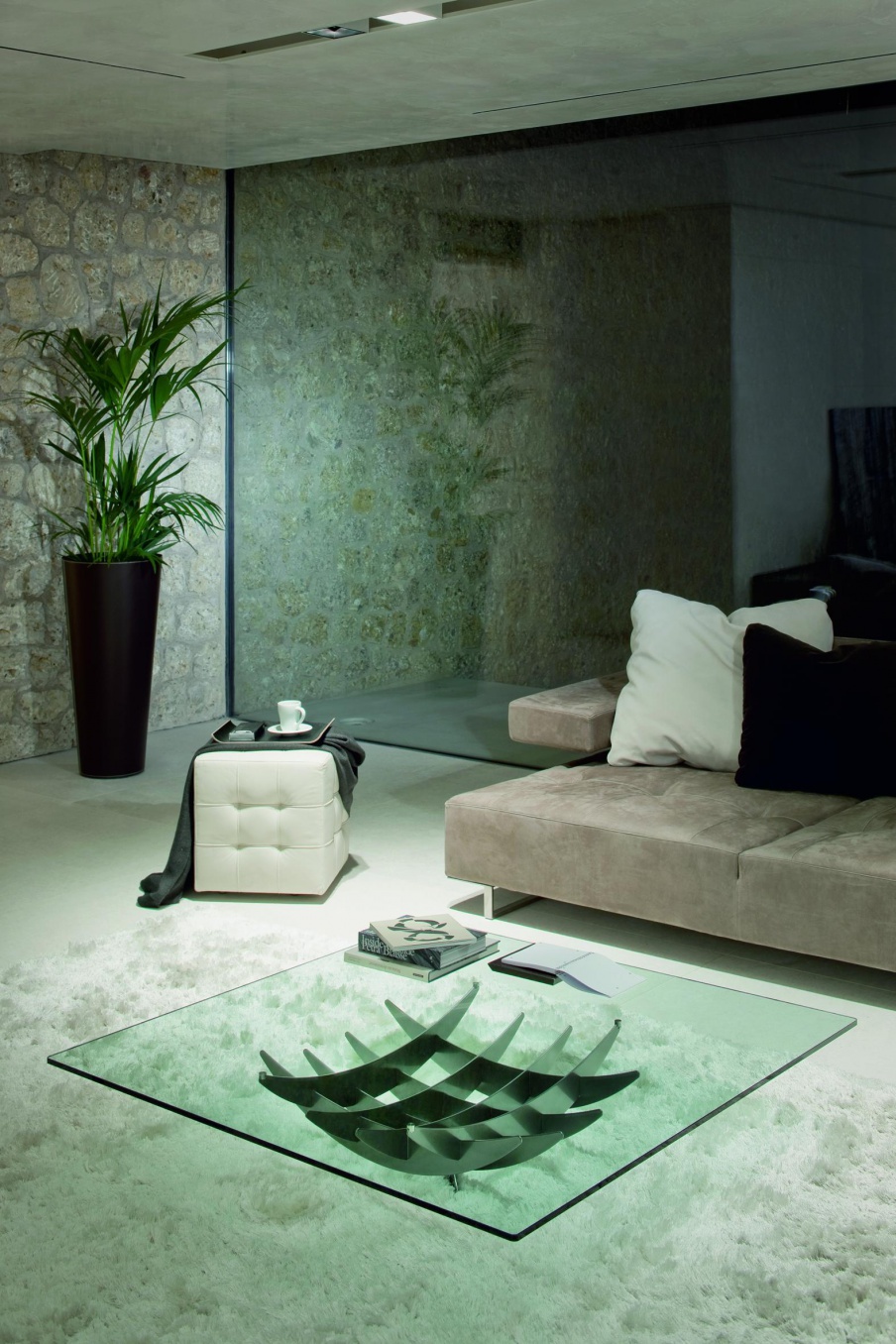 A coffee table on a steel base with glass top Atlas, Cattelan Italia