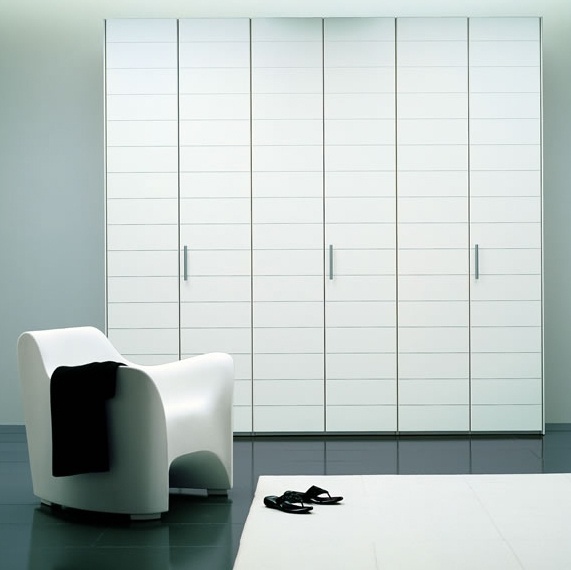 The wardrobe is finished with wood veneer and colored glass Cupboard 6, Pescarollo