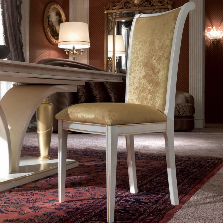 A chair upholstered in The Palm, Turri