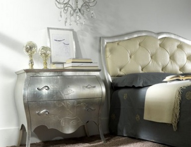 A chest of drawers on high legs, at the stilema stand