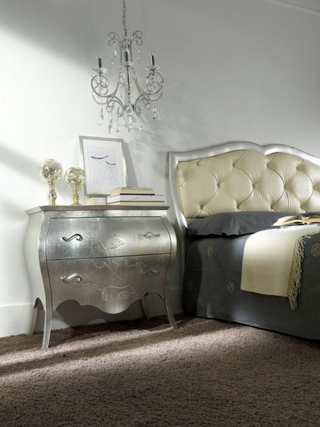 A chest of drawers on high legs, at the stilema stand