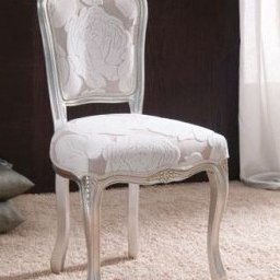 The chair is upholstered in Clarissa