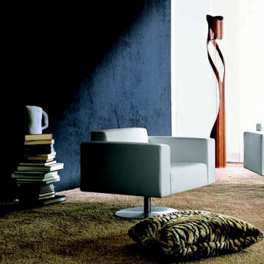 Armchair with soft armrests