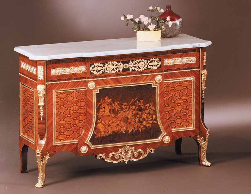 A chest of drawers on high legs, Binda Mobili