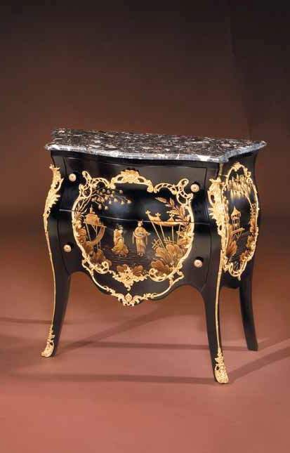 A chest of drawers on high legs, Binda Mobili