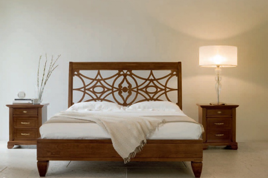 Double bed with decorative headboard, Bruno Piombini