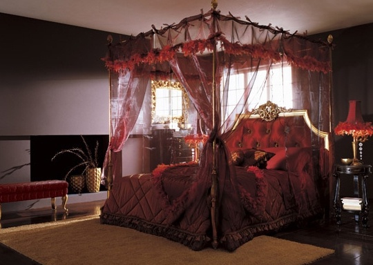 13 double bed with canopy and a high, cushioned headboard from the Italian manufacturer Volpi