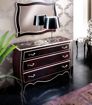 A chest of drawers, decorated with inlay,Tosato