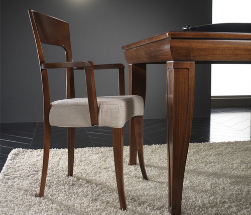 Chair with armrests, at the stilema stand