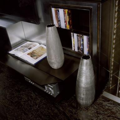 The panel under the TV to The Wall Home Cinema