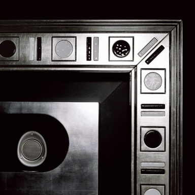 The panel under the TV to The Wall Home Cinema