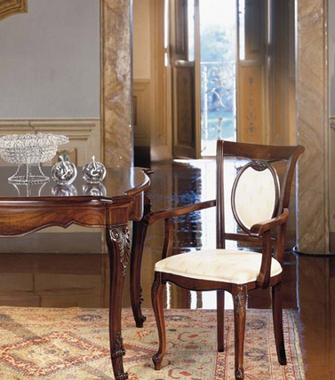 Chair with armrests, at the stilema stand