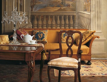 Chair with armrests, at the stilema stand