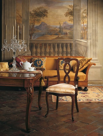 Chair with armrests, at the stilema stand