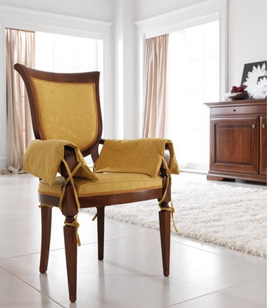 Chair with armrests, at the stilema stand