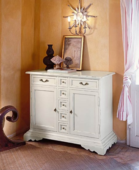 Wooden chest of drawers on low legs, Tonin casa