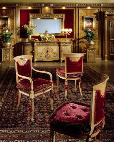 A chair with soft upholstery, Emergroup