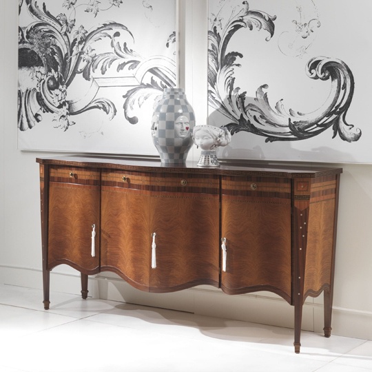 A chest of drawers on high legs, Carpanelli