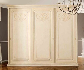 Tricuspid wardrobe with sliding doors on the frame of tamborito Giotto, Benedetti
