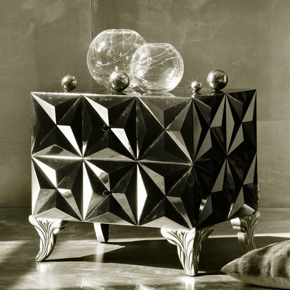 A chest of drawers on a frame of wood with silver legs Diamond, Bizzotto