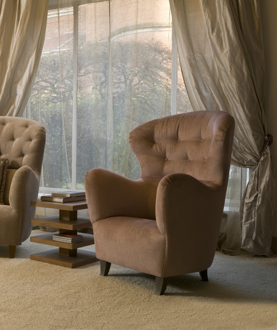 A wide seat with legs out of cherry wood, Annibale Colombo