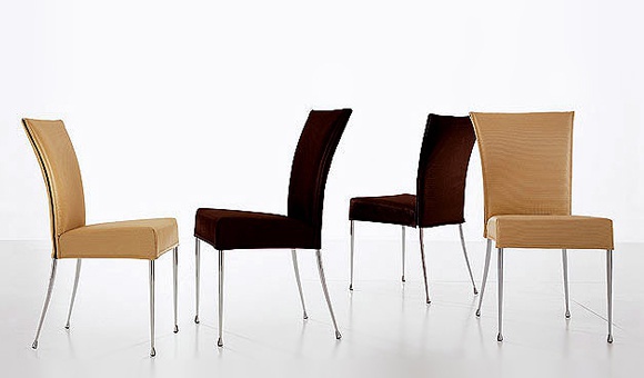 A chair on a frame of chrome plated steel upholstered in leather or fabric Martina Bonaldo
