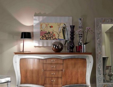 A chest of drawers on high legs, Stella Del Mobile