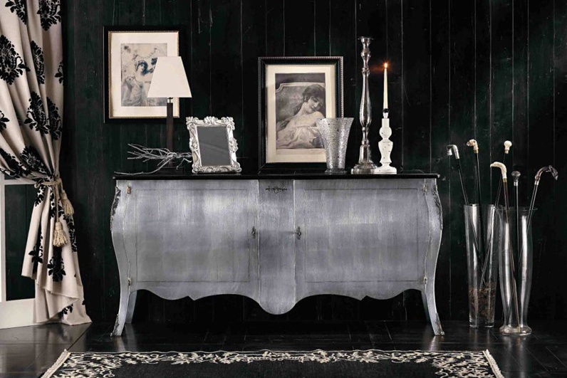 A chest of drawers with hinged doors, Stella Del Mobile