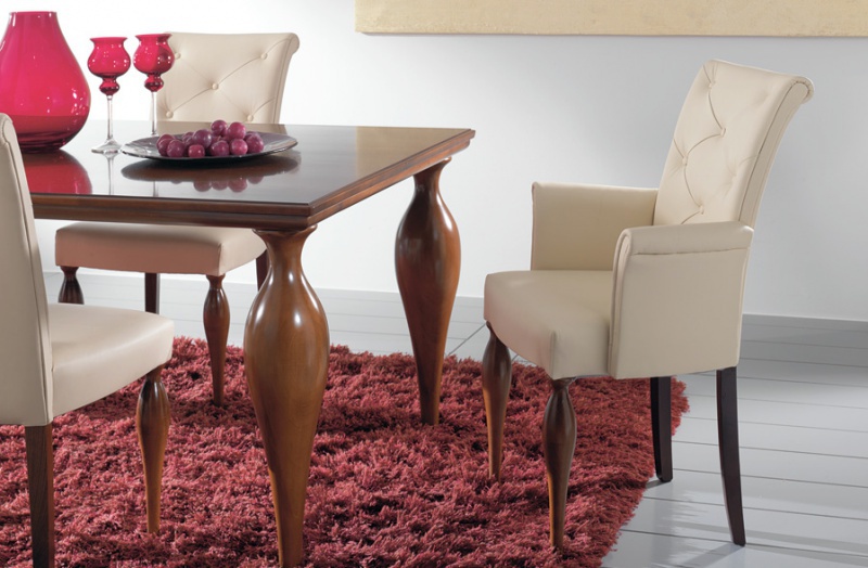 Chair with armrests, at the stilema stand