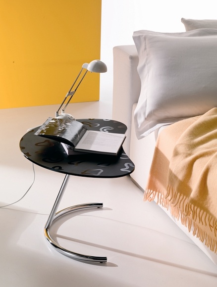 A coffee table on a frame of chromed steel with glass top Bixy, Bontempi Casa