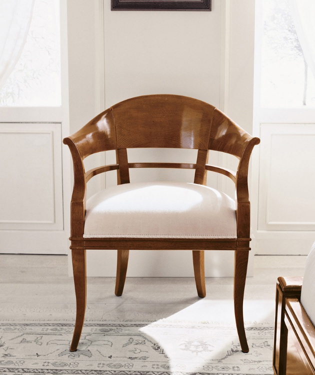 A chair on a frame of solid beech upholstered in leather or fabric 9798, Bruno Piombini