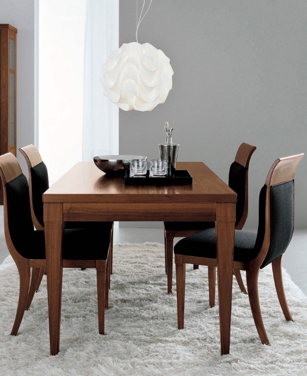 A chair on a frame of beech upholstered in leather or fabric 8050, Bruno Piombini