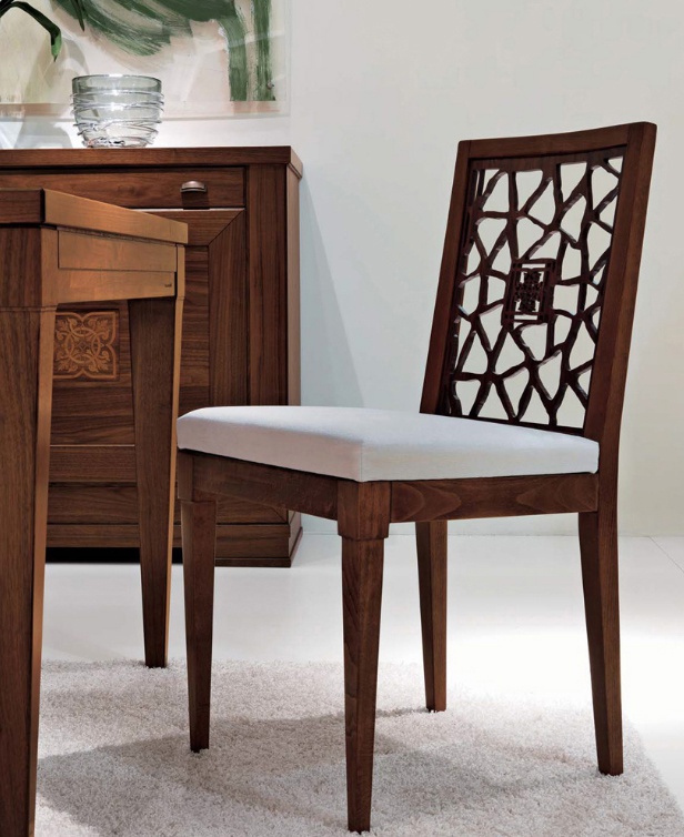 A chair on a frame of beech upholstered in leather or fabric 8052, Bruno Piombini