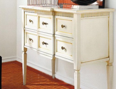 A chest of drawers on high legs, Flai