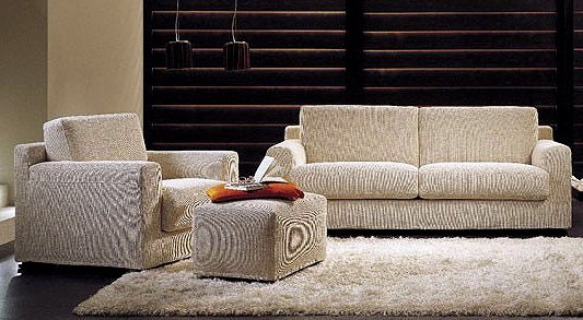 The chair frame is made of wood and metal upholstered Esme, Busnelli