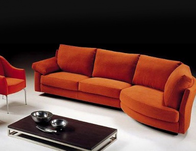 A modular sofa on a frame of solid wood upholstered in leather or fabric Girondo, Busnelli