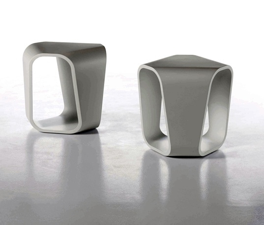 A coffee table on a frame of bent plywood Infinity, Busnelli