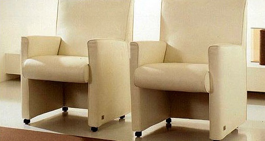 Armchair with metal frame upholstered in leather or fabric Isetta, Busnelli