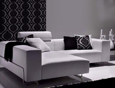 A modular sofa on a frame of solid wood upholstered in leather or fabric Landing, Busnelli