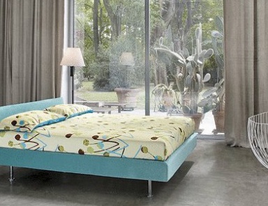 A bed on a wooden frame upholstered in cloth Mister Billo, Bonaldo