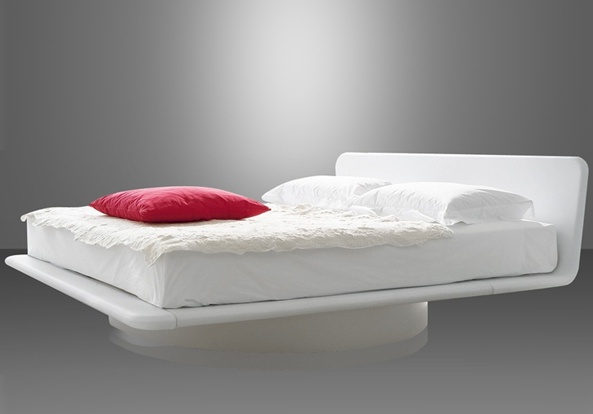 Double bed on a frame of solid wood upholstered in leather or fabric Giotto Bonaldo