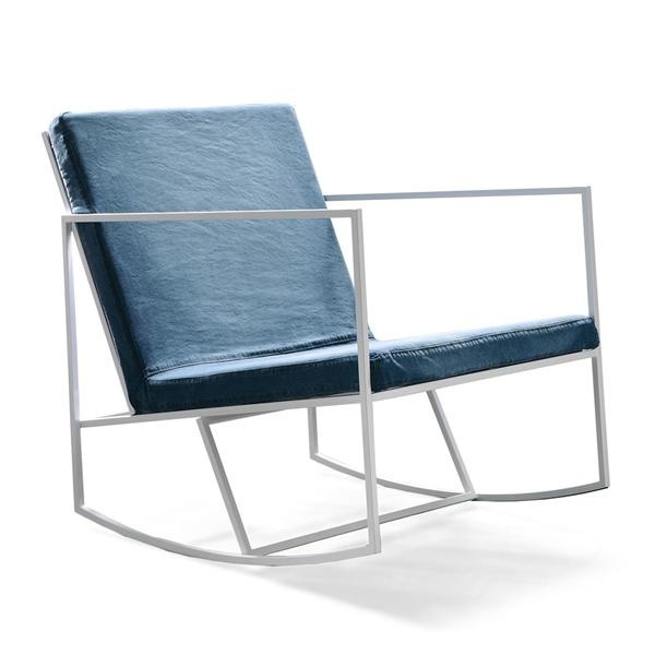 Rocking chair with frame made of metal and upholstery of textile fabric