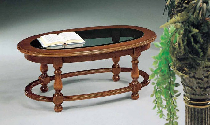 A coffee table on a frame of solid wood with glass insert 3231, BTC