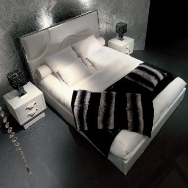 Bed with soft back Riflesso