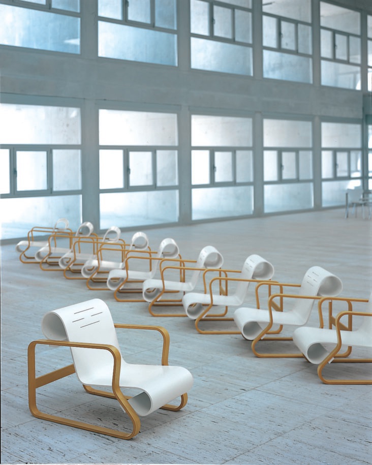 A chair made of wood and seat in plywood Museum, Alivar