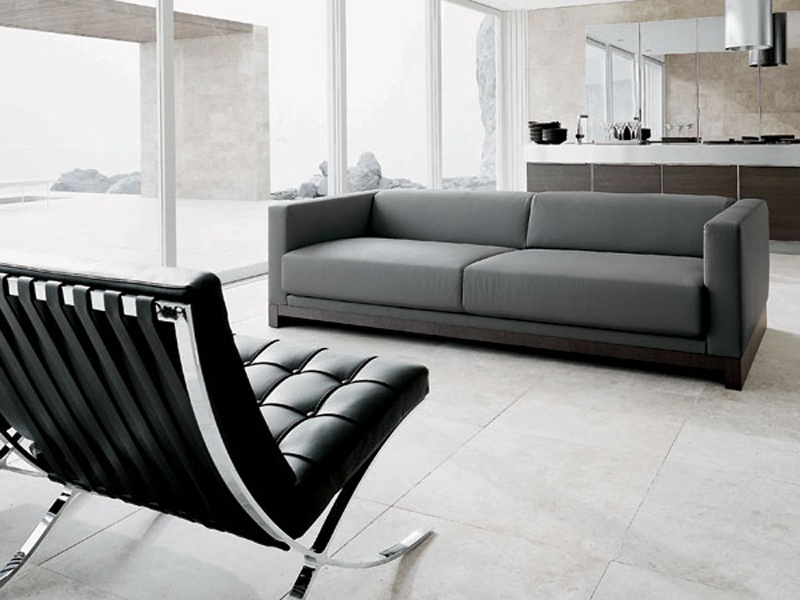 Sofa with a frame made of wood and steel and upholstered in leather or textile fabrics of Soho, Alivar