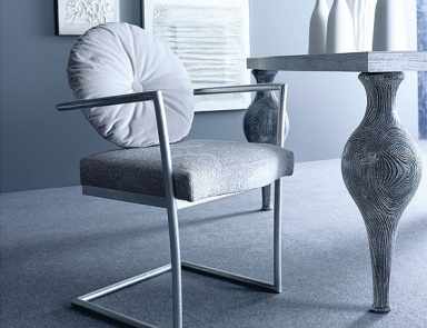 The chair is upholstered with leather or cloth Di Casa, Ego