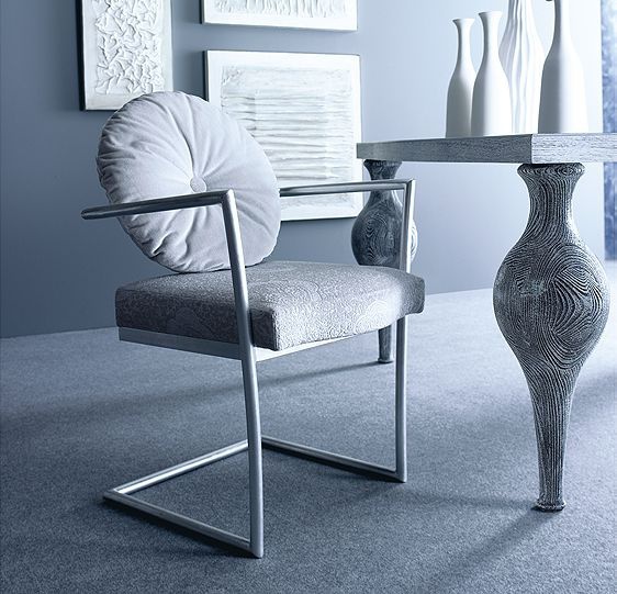 The chair is upholstered with leather or cloth Di Casa, Ego