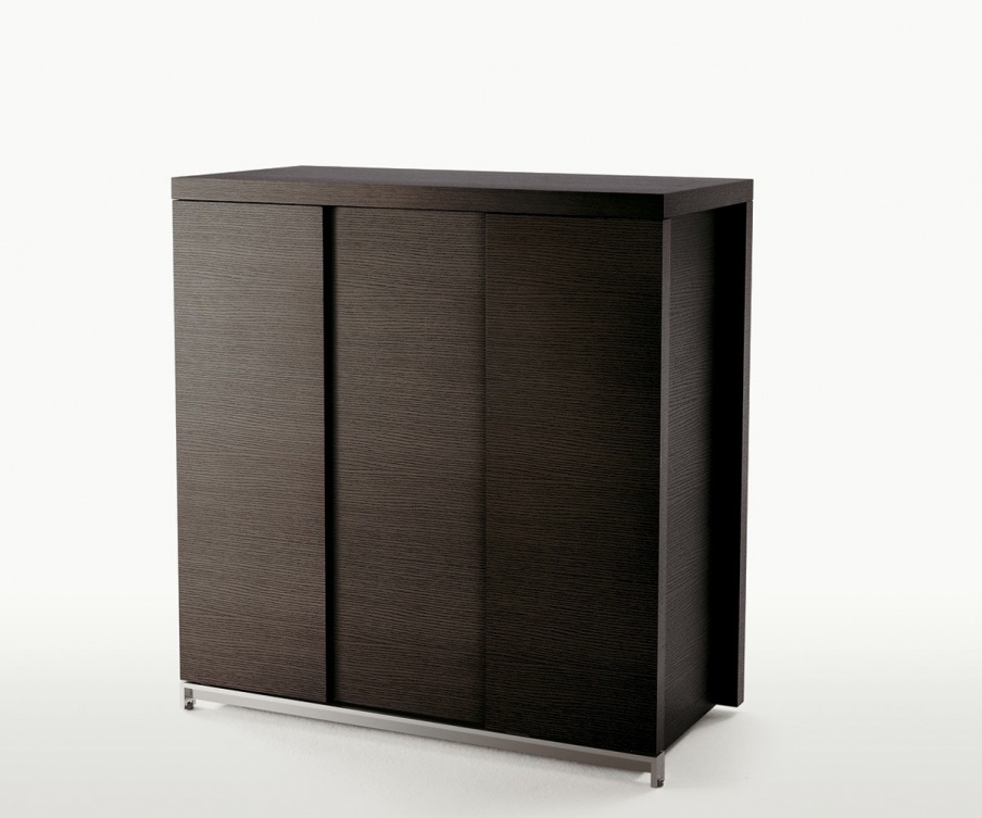 Creso bookcase with sliding shutters, Maxalto